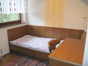 Ein Bett oder Betten in einem Zimmer der Unterkunft Ferienwohnungen Tillian