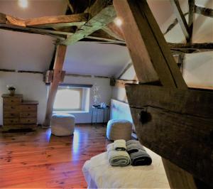 Postel nebo postele na pokoji v ubytování Maison Olleris