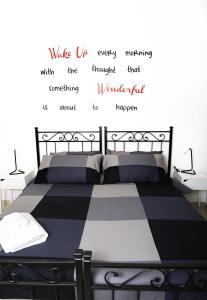 A bed or beds in a room at ImeraRooms