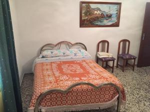 Ένα ή περισσότερα κρεβάτια σε δωμάτιο στο Cortijo La Huerta