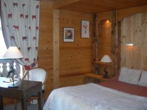 Кровать или кровати в номере Le Cordonant