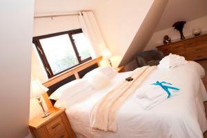 Postel nebo postele na pokoji v ubytování Abhainn Cottage + 14 fotografií