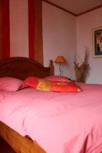Letto o letti in una camera di Hostellerie de Genève