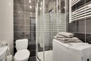 Kúpeľňa v ubytovaní KATO Apartamenty Centrum + 37 fotografií