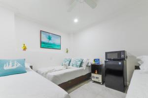 Cama ou camas em um quarto em Hotel Las Lunas