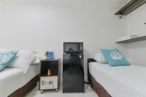 Cama ou camas em um quarto em Hotel Las Lunas
