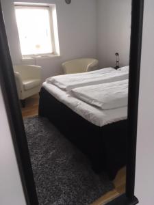 Postel nebo postele na pokoji v ubytování Borrby Frö B&B