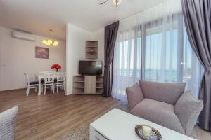 Televiisor ja/või meelelahutuskeskus majutusasutuses Apartments Monte Re