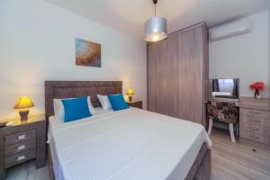 Voodi või voodid majutusasutuse Apartments Monte Re toas
