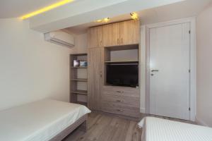 Voodi või voodid majutusasutuse Apartments Monte Re toas