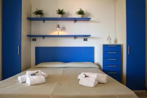 Кровать или кровати в номере Residence Mediterraneo