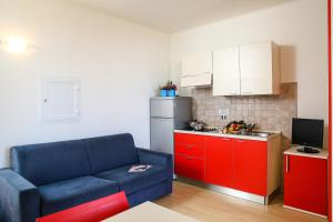 Кухня или мини-кухня в Residence Mediterraneo
