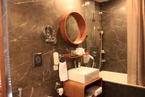 Koupelna v ubytování Udman Hotel Panchshila Park