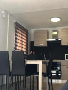 Kuchyň nebo kuchyňský kout v ubytování Villa hortencia