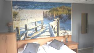 Ένα ή περισσότερα κρεβάτια σε δωμάτιο στο Hotel Velsen