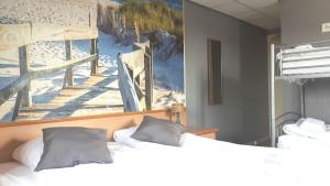 Ένα ή περισσότερα κρεβάτια σε δωμάτιο στο Hotel Velsen