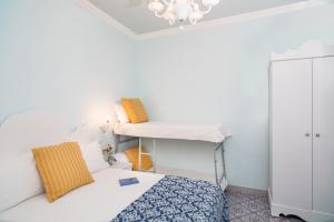 Postel nebo postele na pokoji v ubytování Hotel Villa Nefele