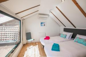 Llit o llits en una habitació de LV Premier Apartments P.Real- PI