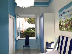 A seating area at Villa glory Mare