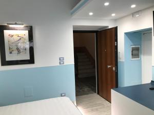 A bed or beds in a room at Villa glory Mare