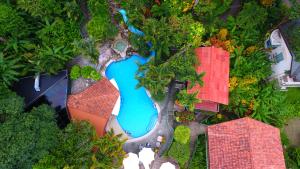 an aerial view of a pool in a resort at Si Como No Resort & Wildlife Refuge in Manuel Antonio