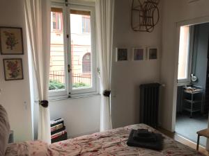 A bed or beds in a room at B&B U Sente