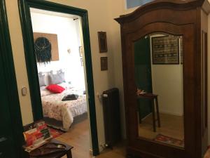 A bed or beds in a room at B&B U Sente
