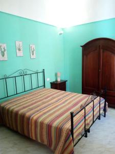 Postel nebo postele na pokoji v ubytování A casa du zù Totò