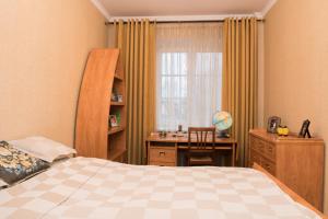 מיטה או מיטות בחדר ב-Classy apartment in good neighbourhood