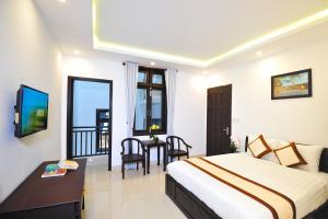 Postel nebo postele na pokoji v ubytování Hoi An Bali Homestay