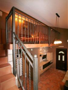 a staircase in a house with a stair case at House on the beach in Kotor