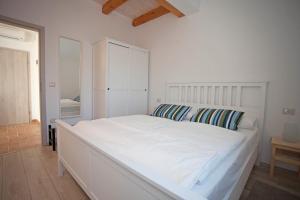 Postel nebo postele na pokoji v ubytování Residence Mama