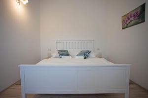 Postel nebo postele na pokoji v ubytování Residence Mama