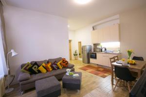 A kitchen or kitchenette at Friends Hostel & Apartments