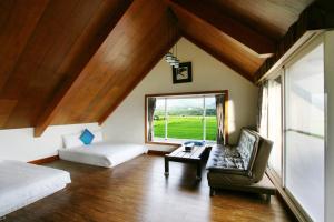 Khu vực ghế ngồi tại Xian Qing Yu Zhi Homestay