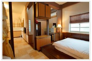 Giường trong phòng chung tại Xian Qing Yu Zhi Homestay