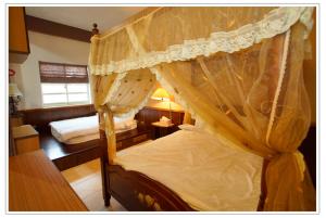 Giường trong phòng chung tại Xian Qing Yu Zhi Homestay