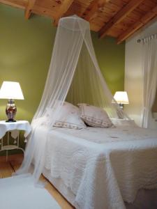 Een bed of bedden in een kamer bij Casa Lindelagua