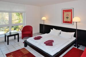 Art Hotel Weimarにあるベッド