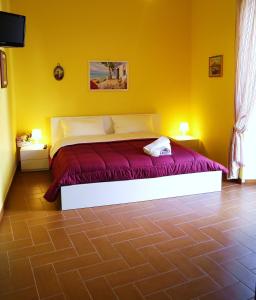 Postel nebo postele na pokoji v ubytování B&B La Muraglia