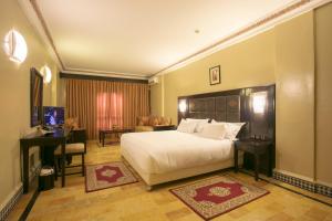 TV a/nebo společenská místnost v ubytování Diwane Hotel & Spa Marrakech