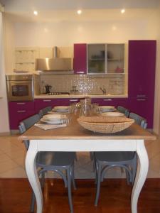 Kuchyň nebo kuchyňský kout v ubytování A Casa Di Elle