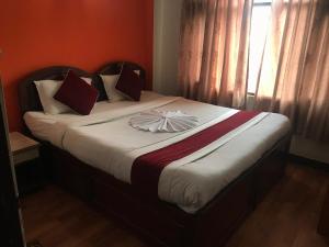Postel nebo postele na pokoji v ubytování Hotel Lily