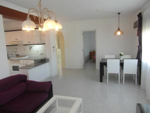 Kuchyň nebo kuchyňský kout v ubytování Apartamento con jardin