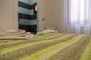 Postel nebo postele na pokoji v ubytování Albergo Felice + 37 fotografií