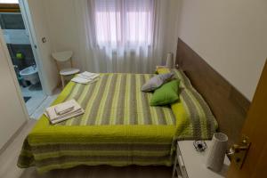 Postel nebo postele na pokoji v ubytování Albergo Felice