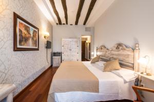 Posteľ alebo postele v izbe v ubytovaní Hotel Alda Vía León + 37 fotografií