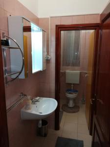 Kúpeľňa v ubytovaní Apartment MIS Floura