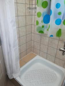 Kúpeľňa v ubytovaní Apartment MIS Floura