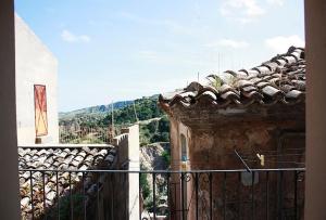 a view from a balcony of a building at Casa Allegra e Colorata in Badolato